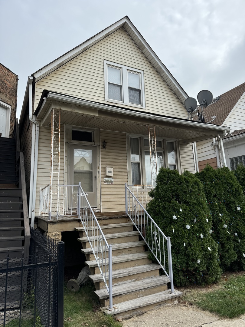 a front view of house with street