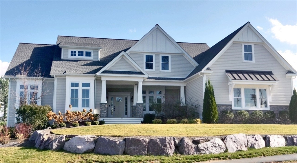 a view of a house with swimming pool and porch