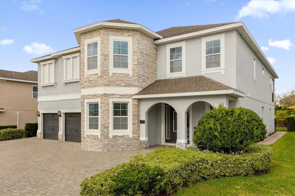 front view of a house with a yard