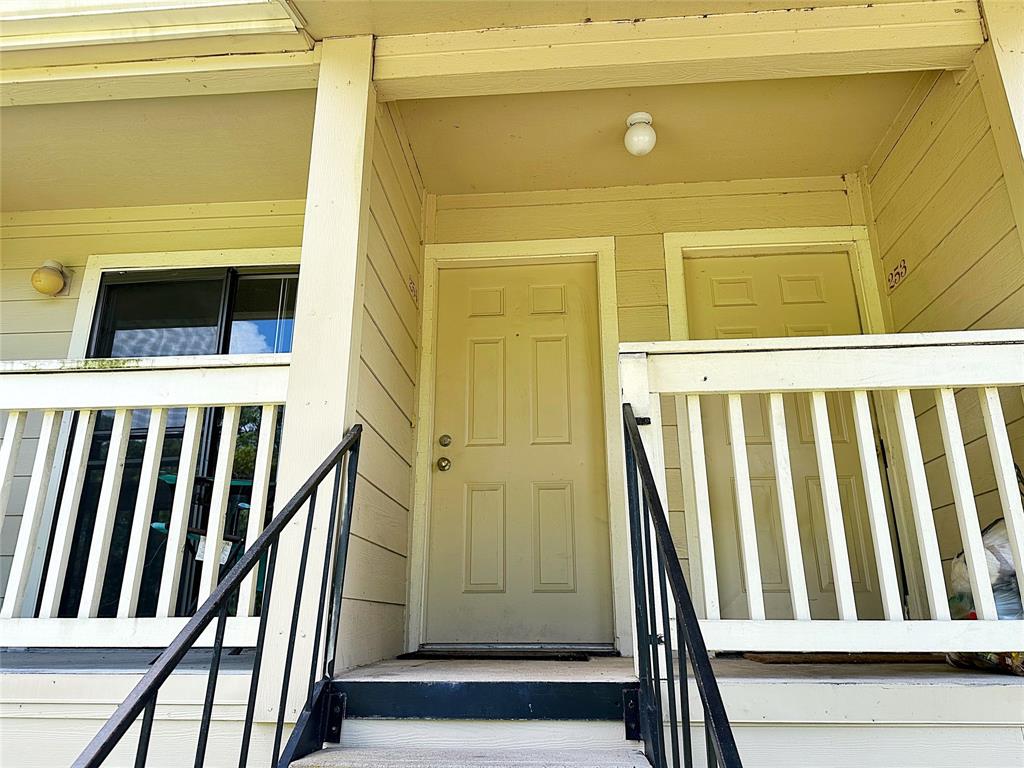 a view of a porch of a house