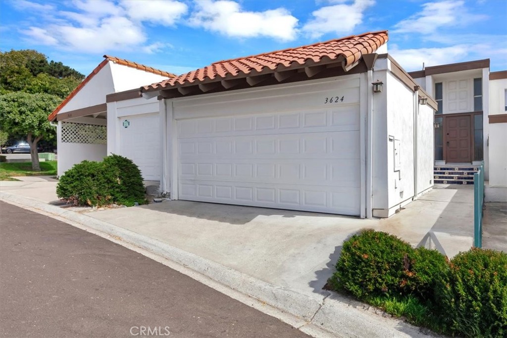 a view of a house with a garage