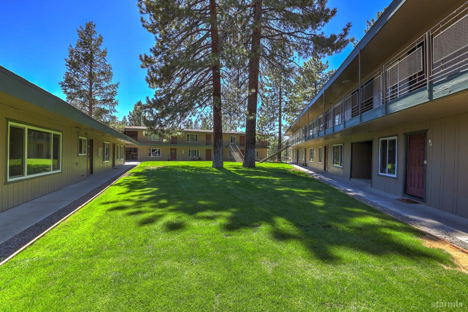 a view of a house with a back yard