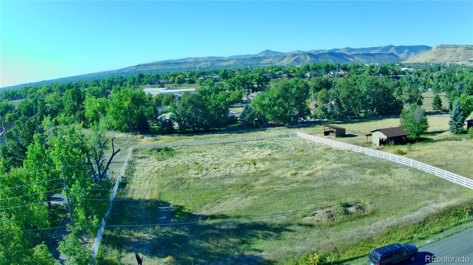 a view of a grassy area with an trees