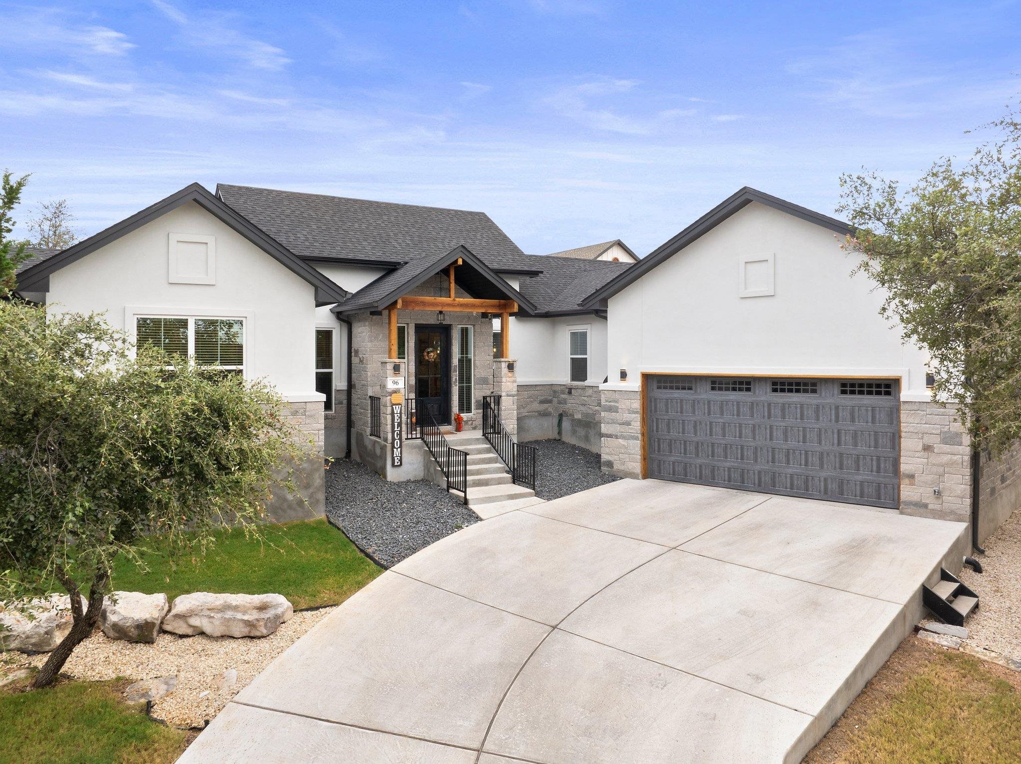 a front view of a house with yard