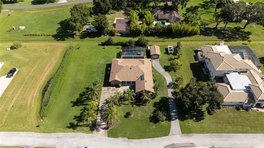 an aerial view of a house with a garden