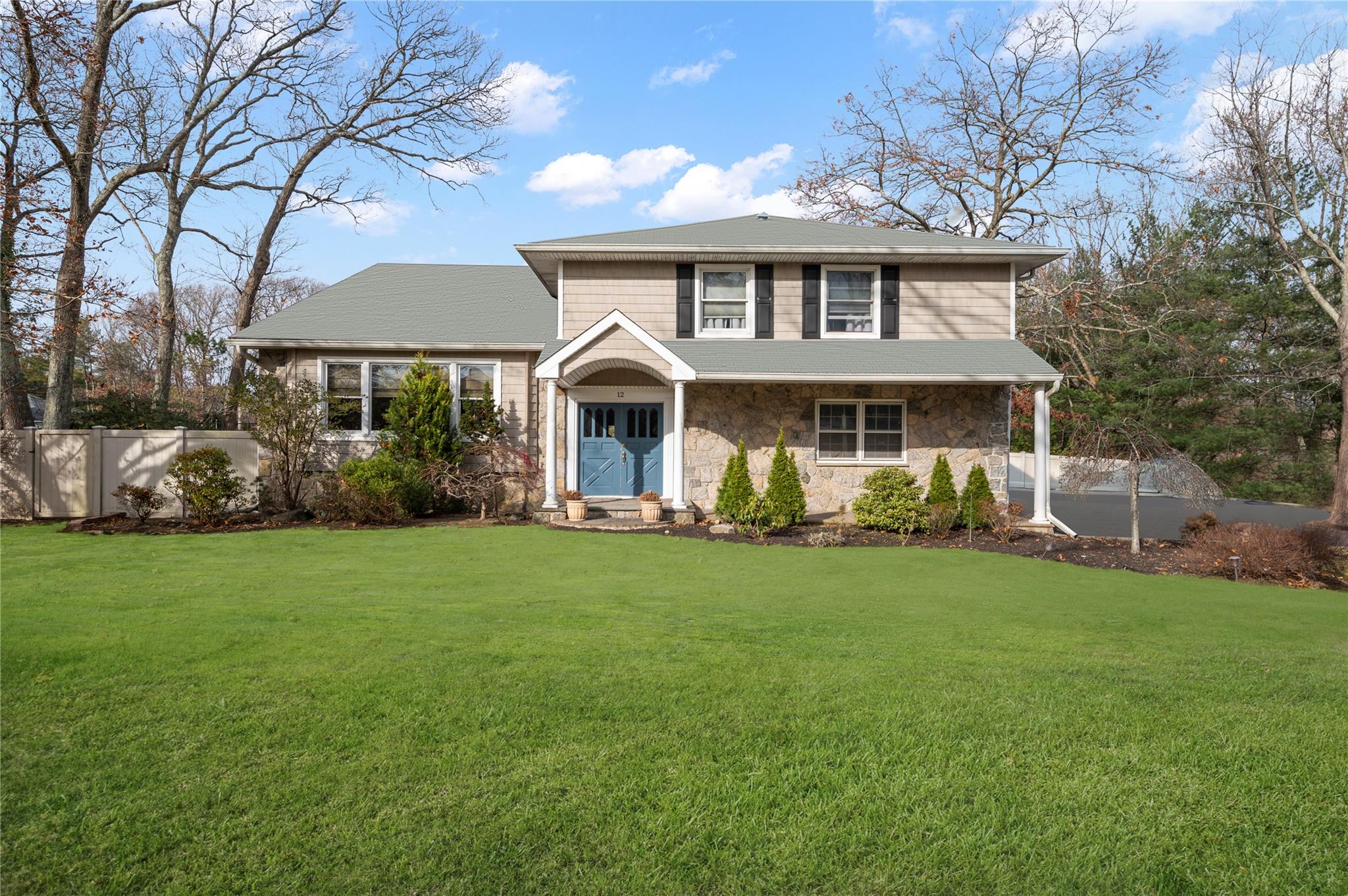 View of front of home featuring a front lawn