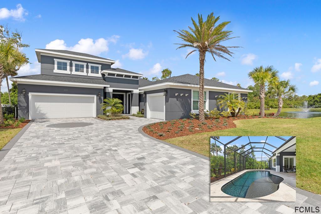 a view of a house with a swimming pool