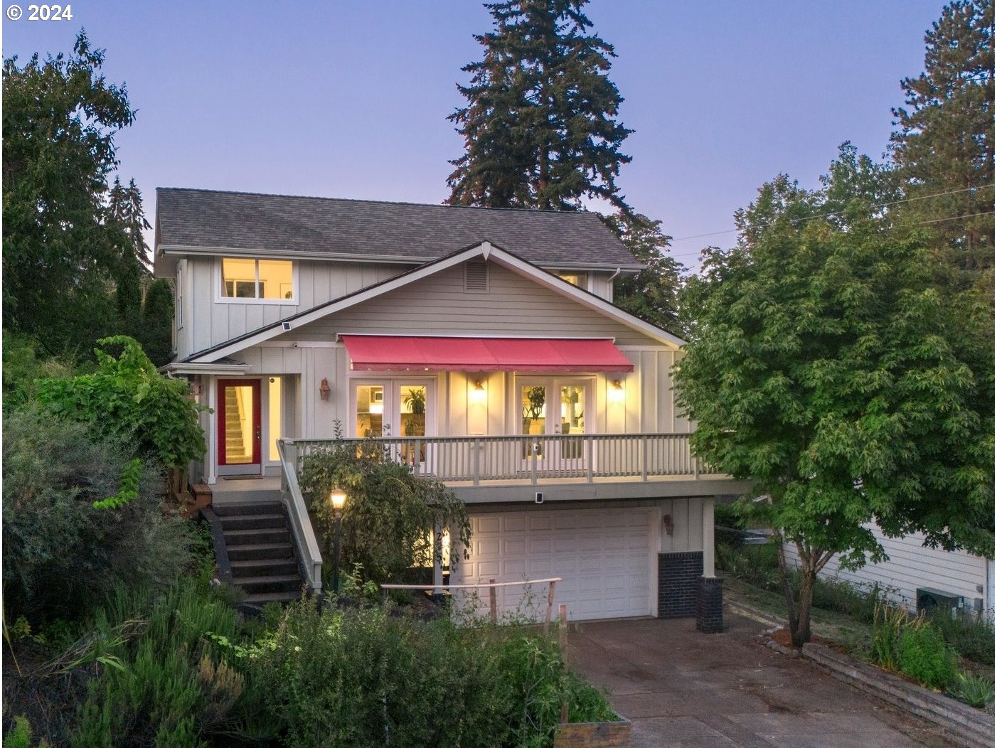 a front view of a house with yard