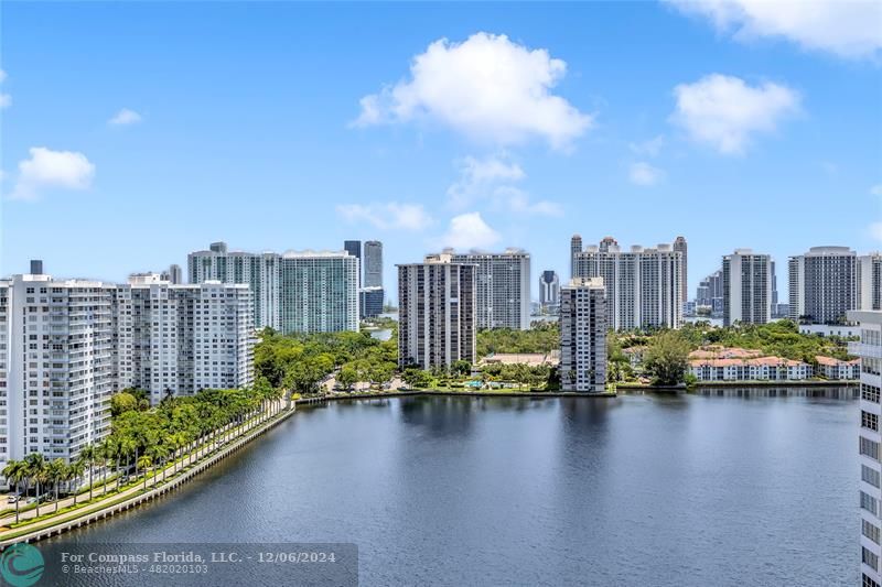 a view of a city with tall buildings