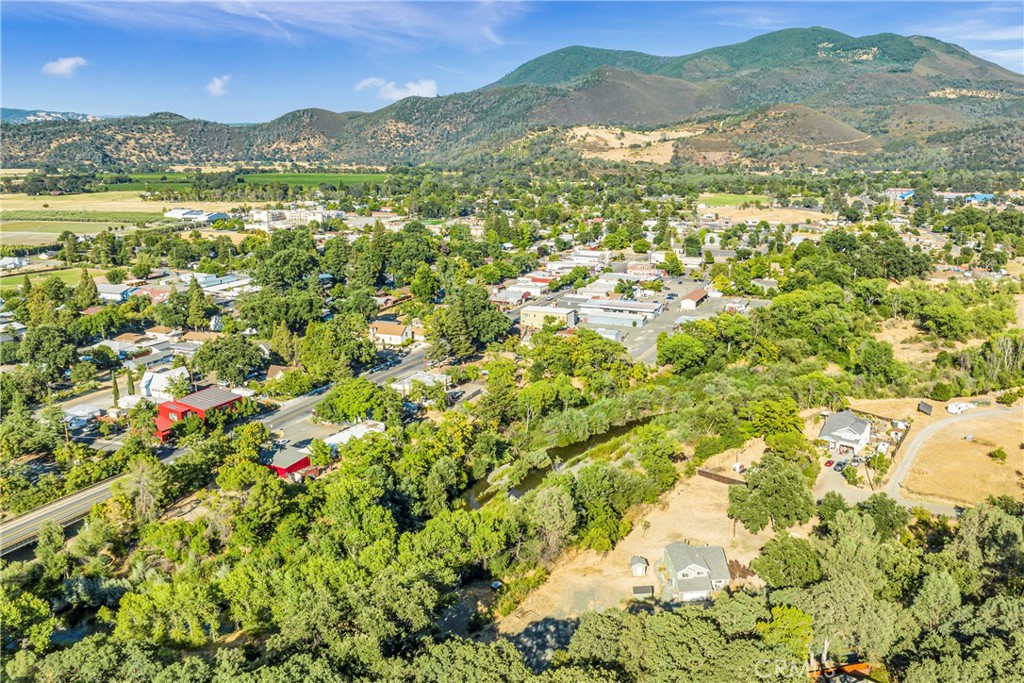 a view of a city with mountains in the background