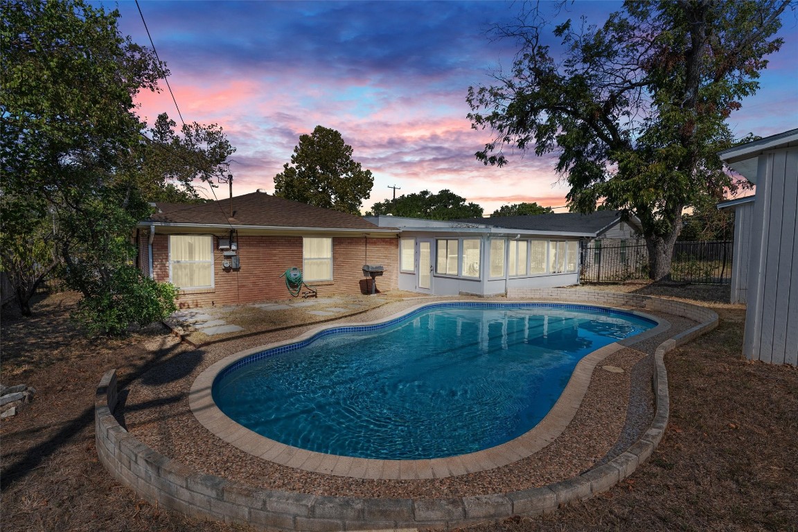 a view of outdoor space yard swimming pool and porch