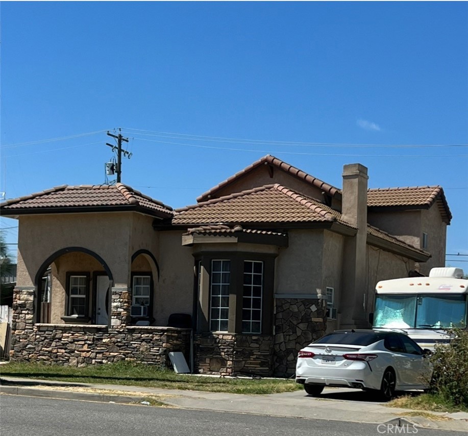 a front view of a house with garage