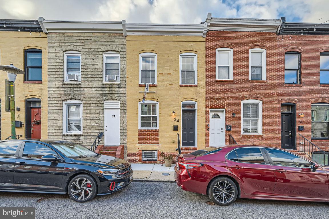 a car parked in front of a building