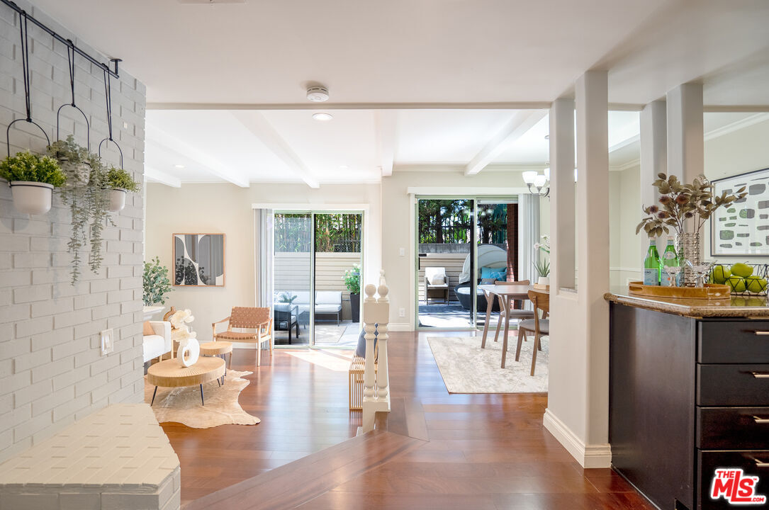 a view of a living room and dining room