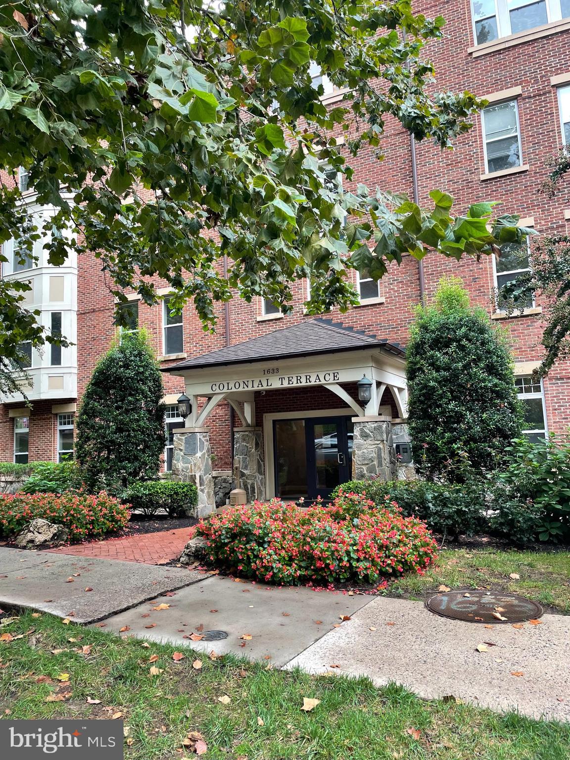 front view of a house with a garden