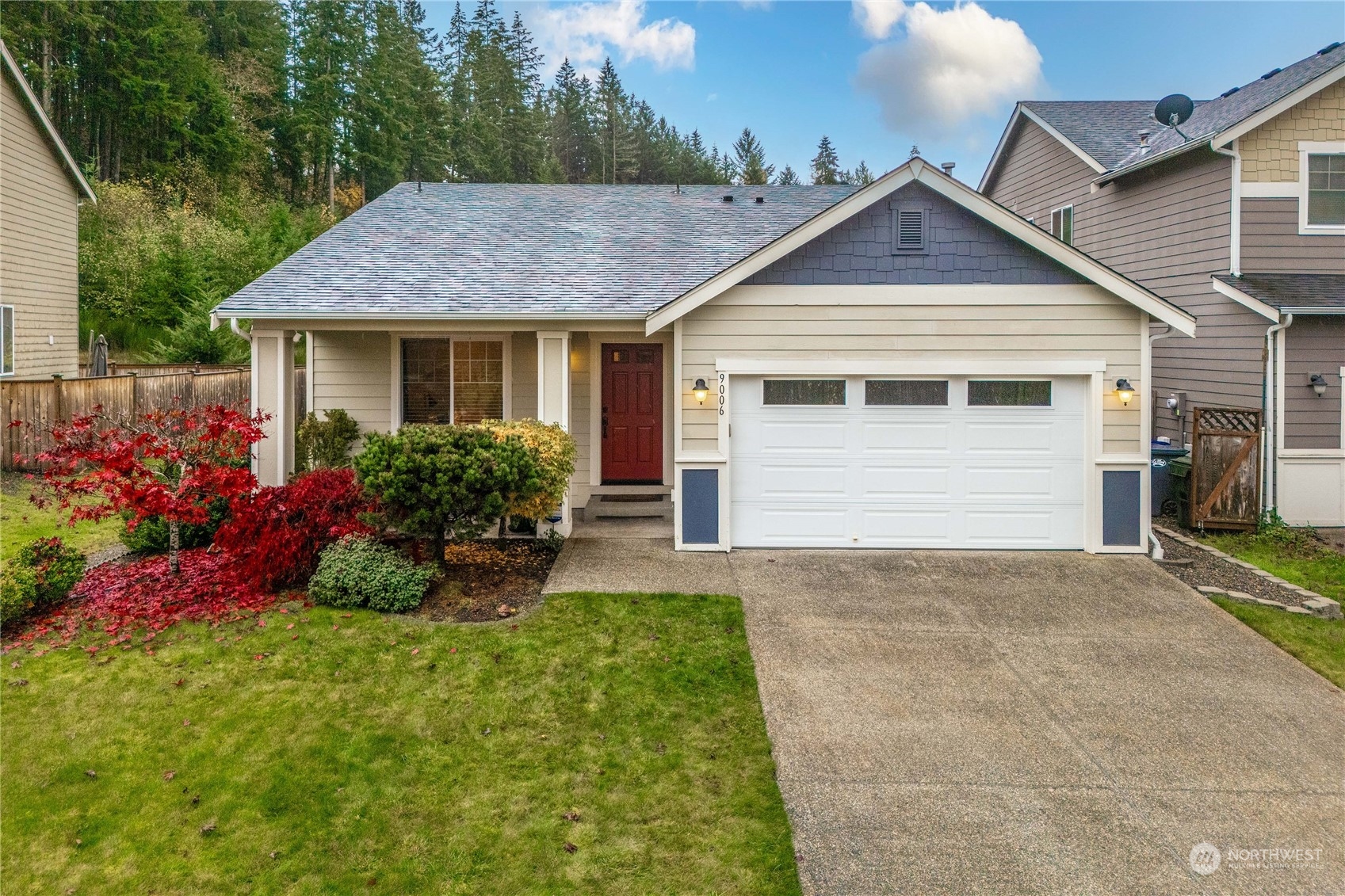 front view of a house with a yard