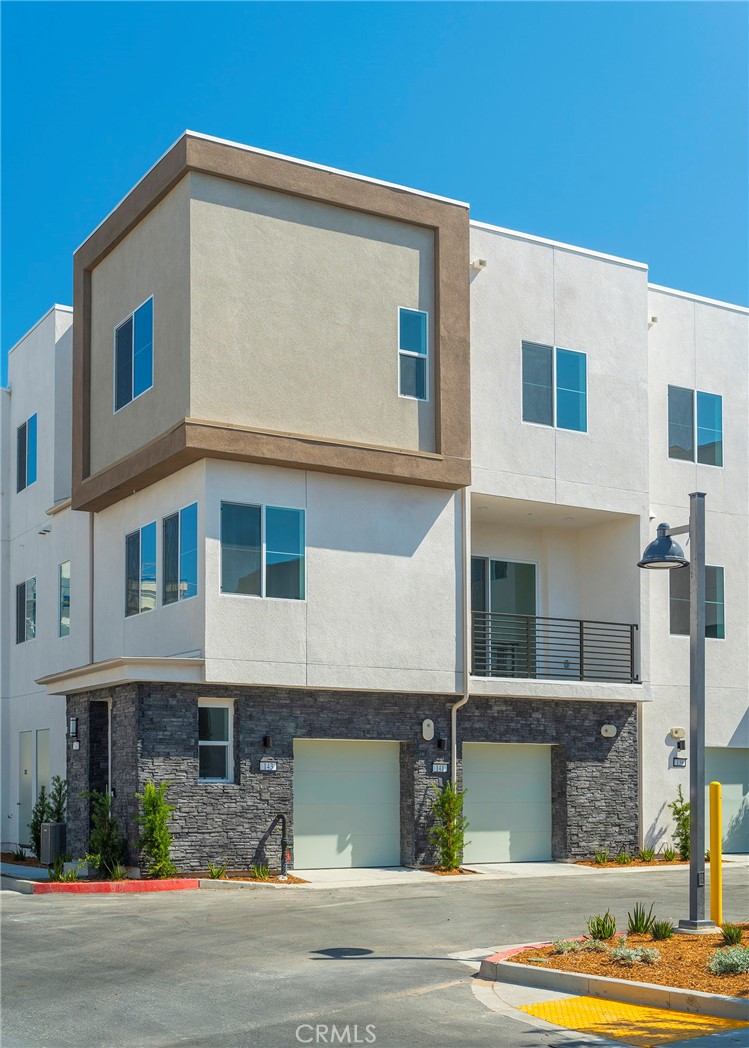 a view of a building with a street