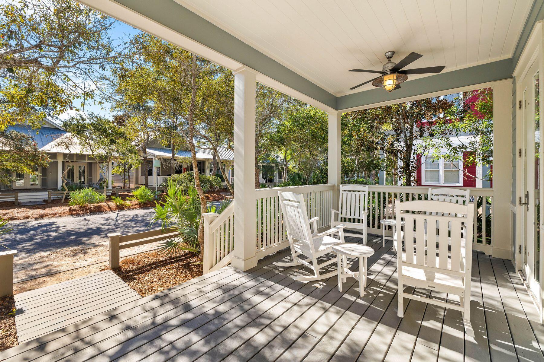 a view of a chairs and table in patio