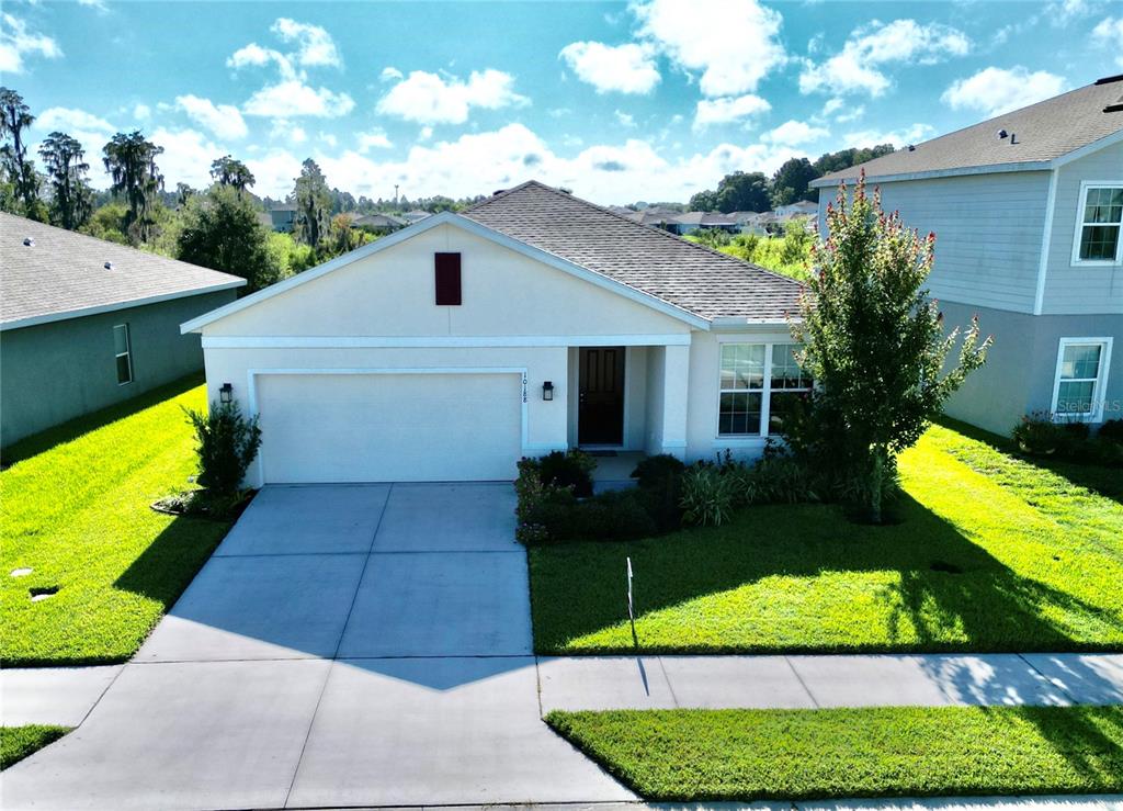 a view of a back yard of the house