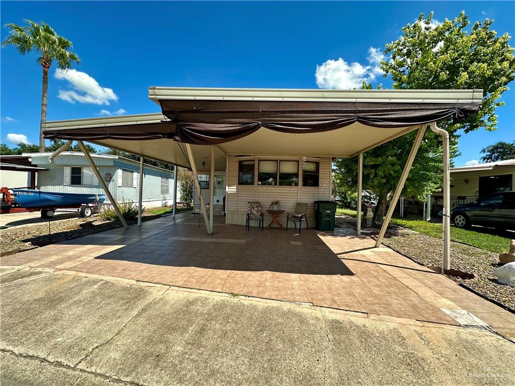 View of car parking with a carport