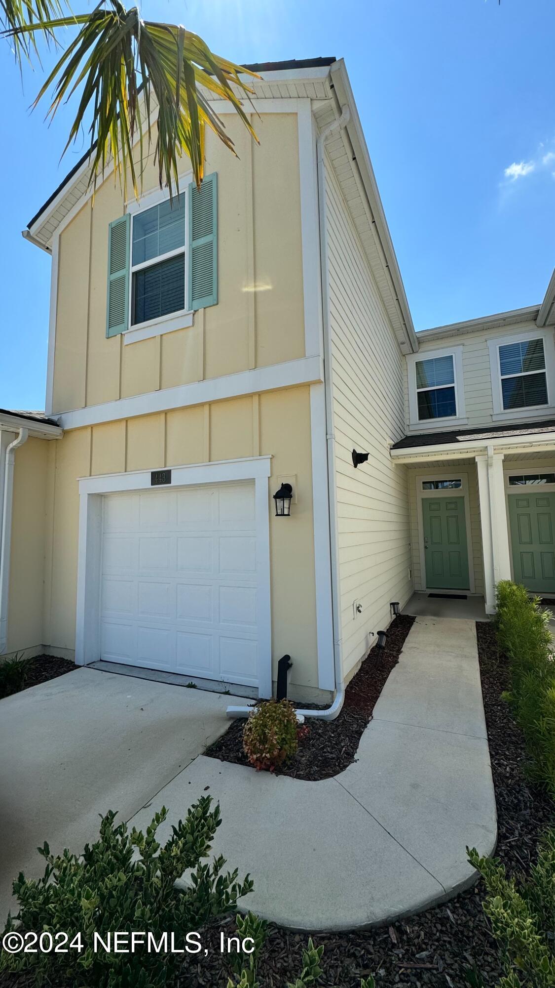 a front view of house with yard