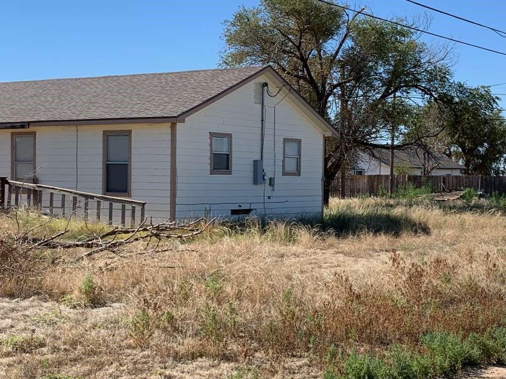 a front view of house with yard