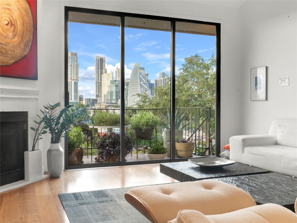 a living room with couch and a large window