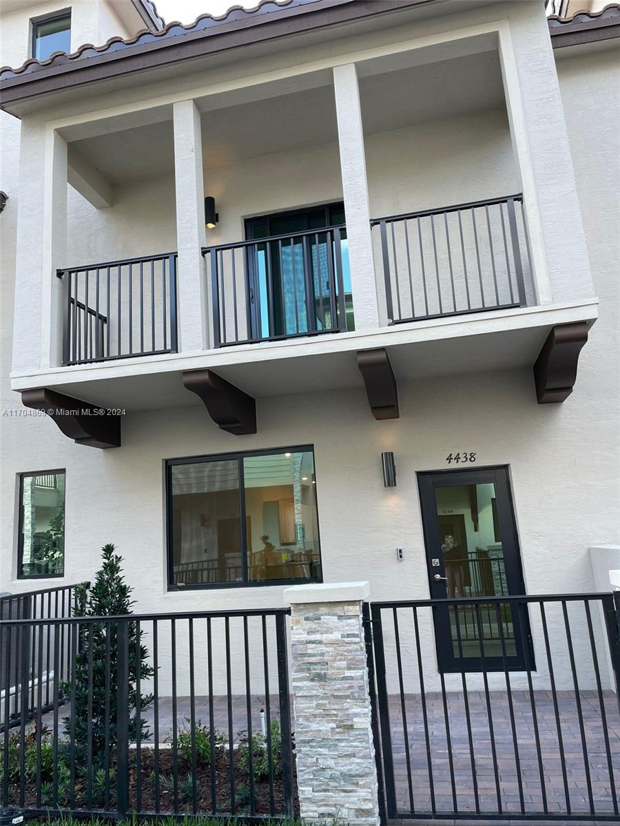 a view of a house with porch deck