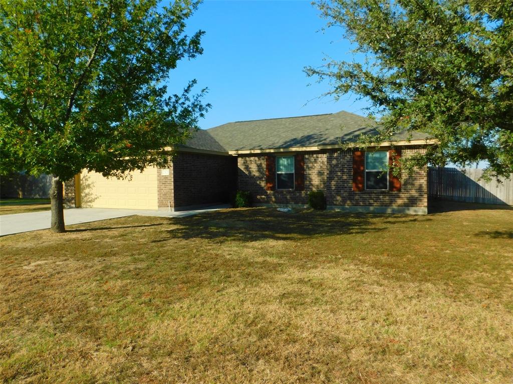 a front view of house with yard