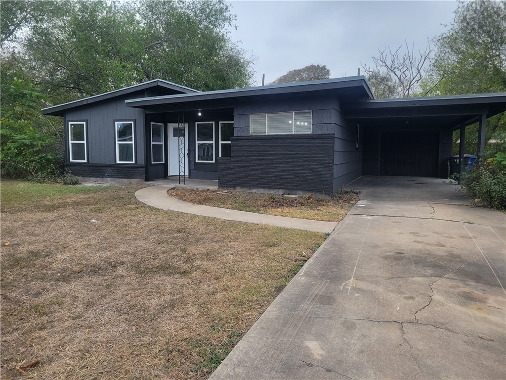 a front view of a house with yard