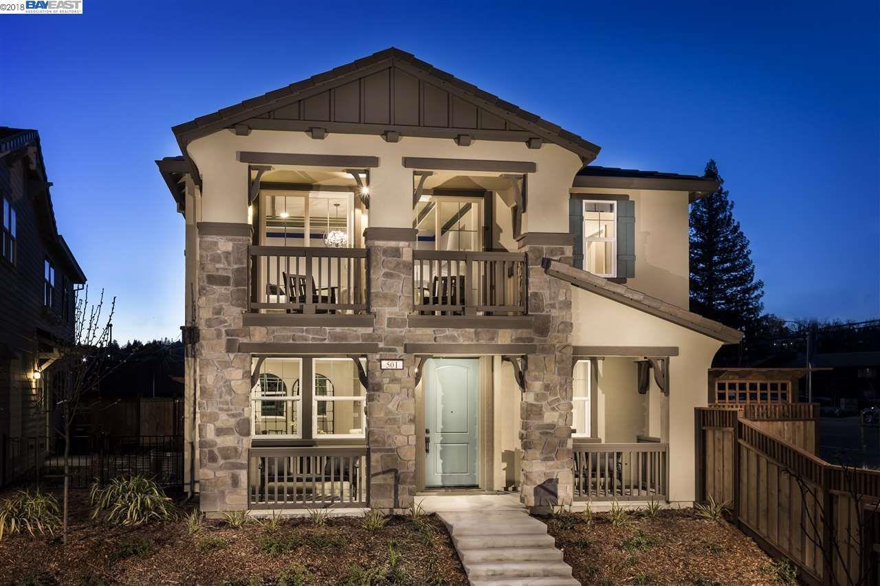 a front view of a house with glass windows