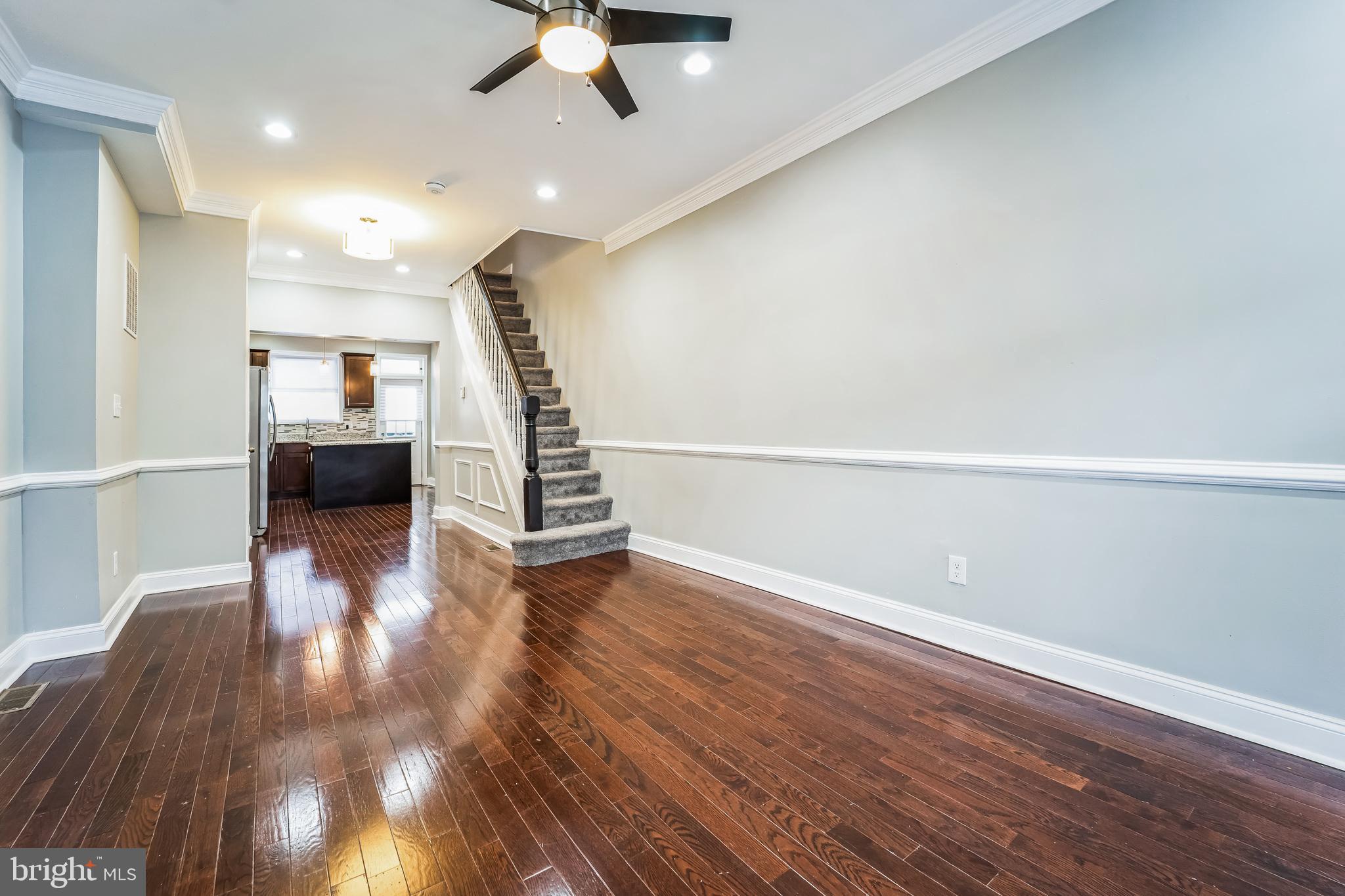 a view of entryway with wooden floor