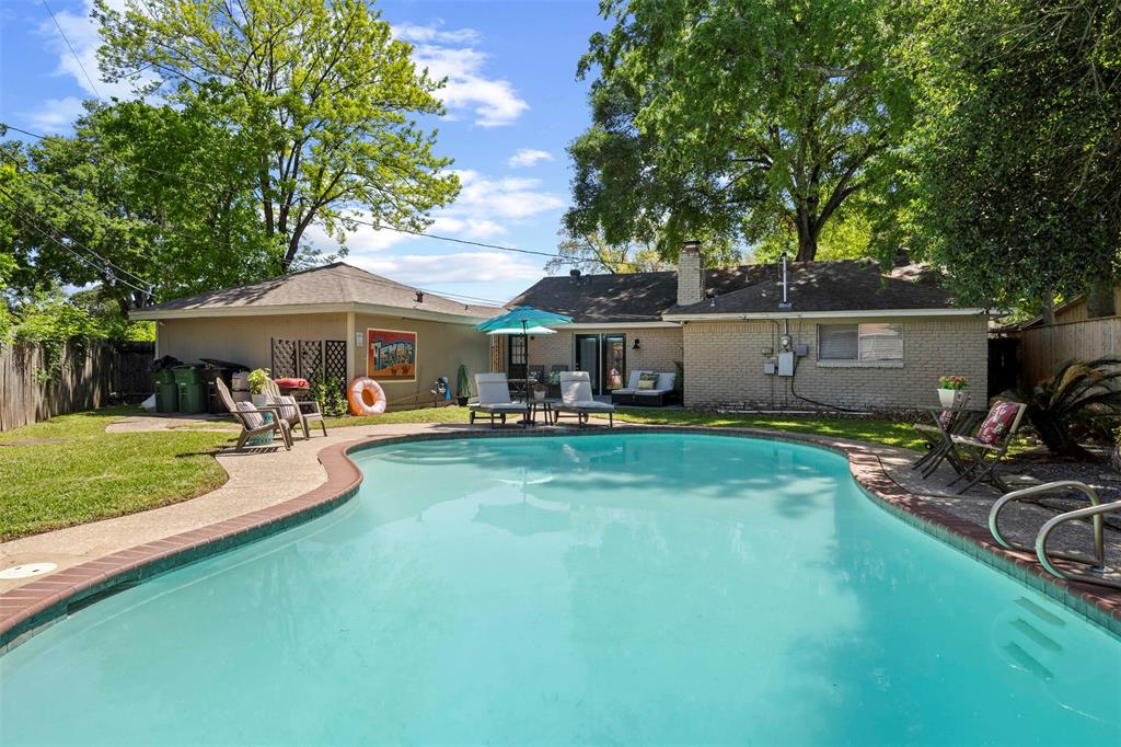 a view of a yard with a patio