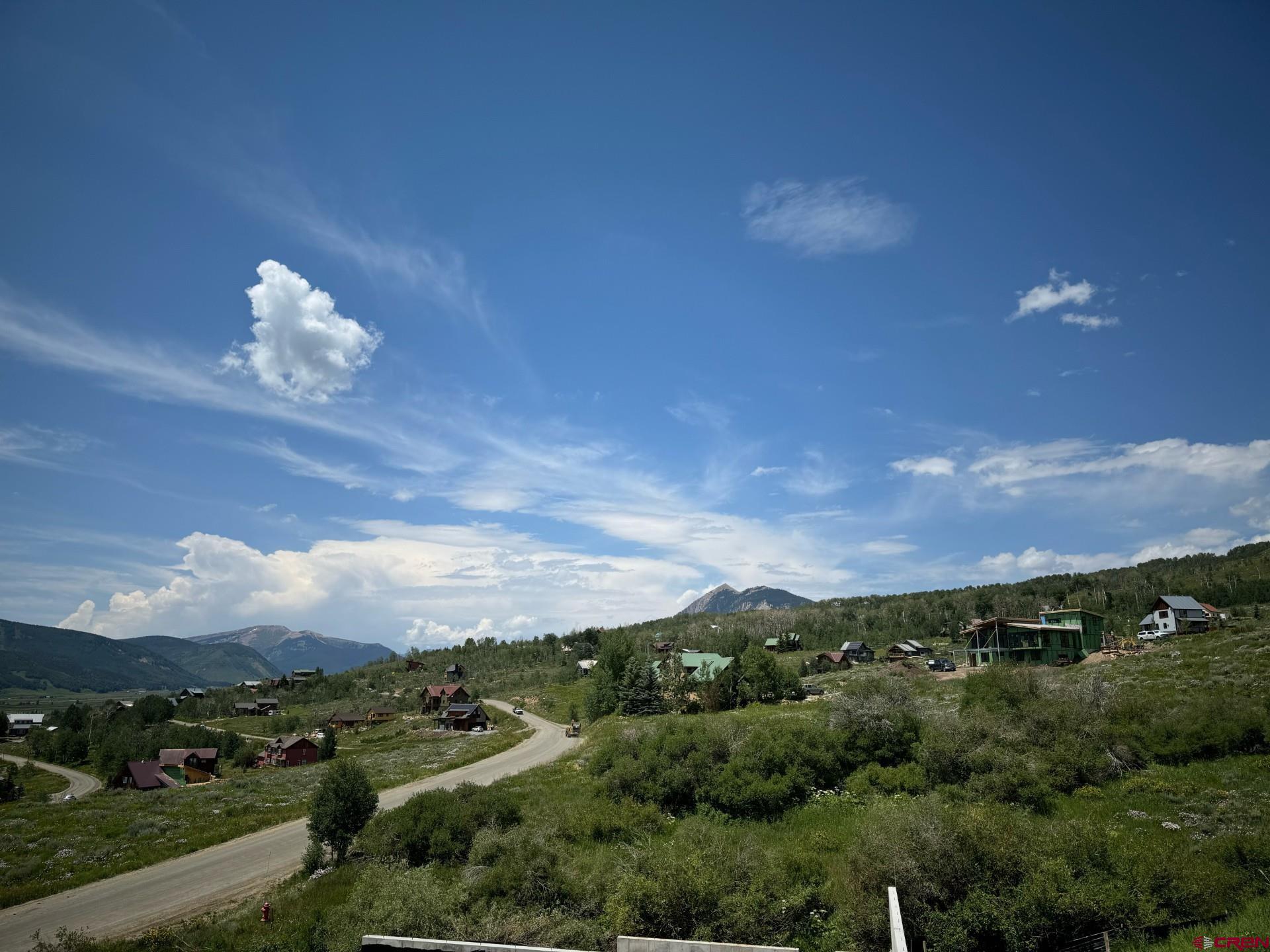 a view of a city and mountain view