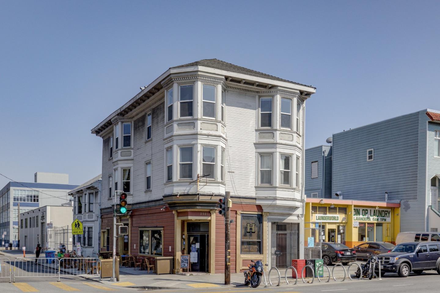 a front view of a building with street view