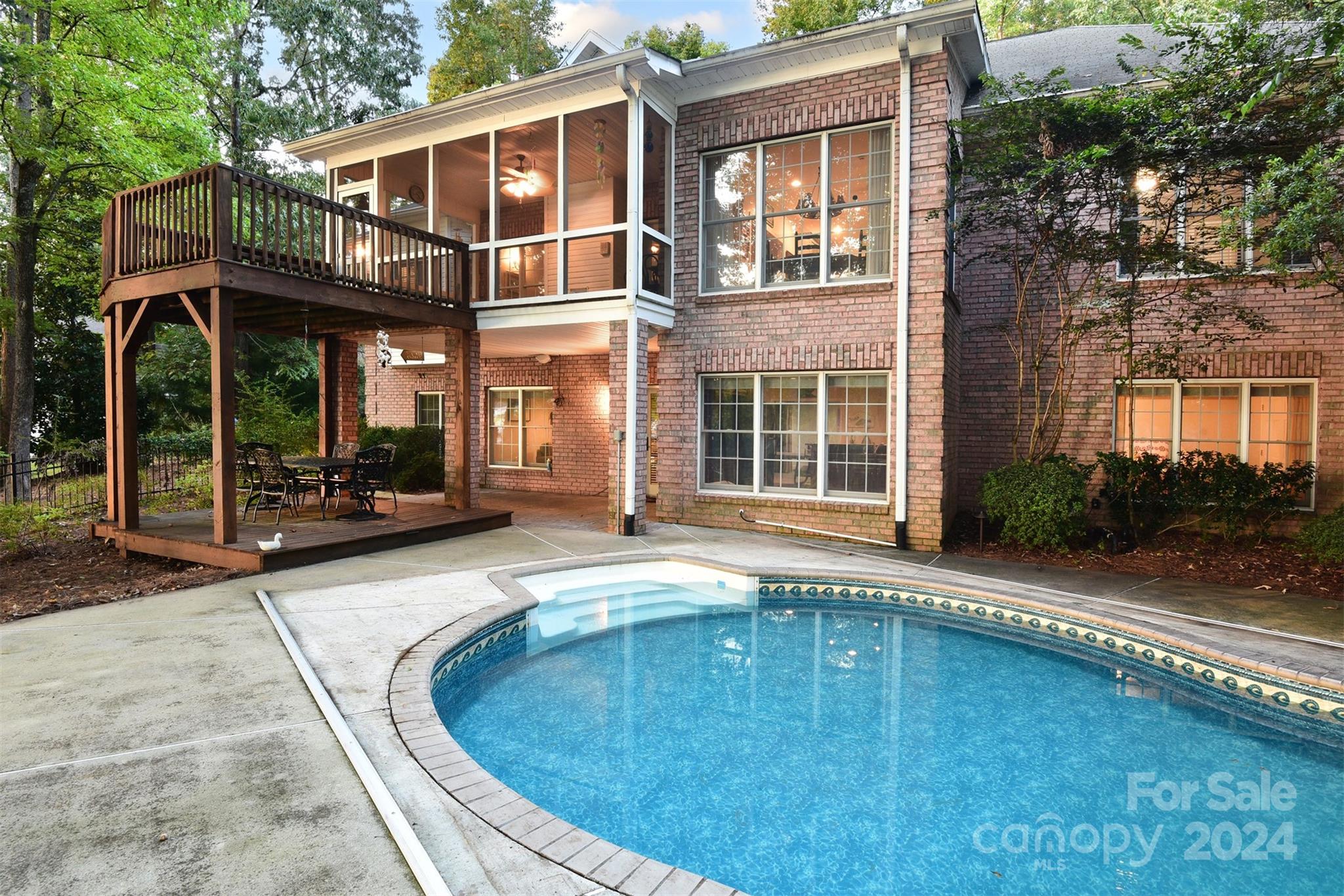 front view of a house with a swimming pool