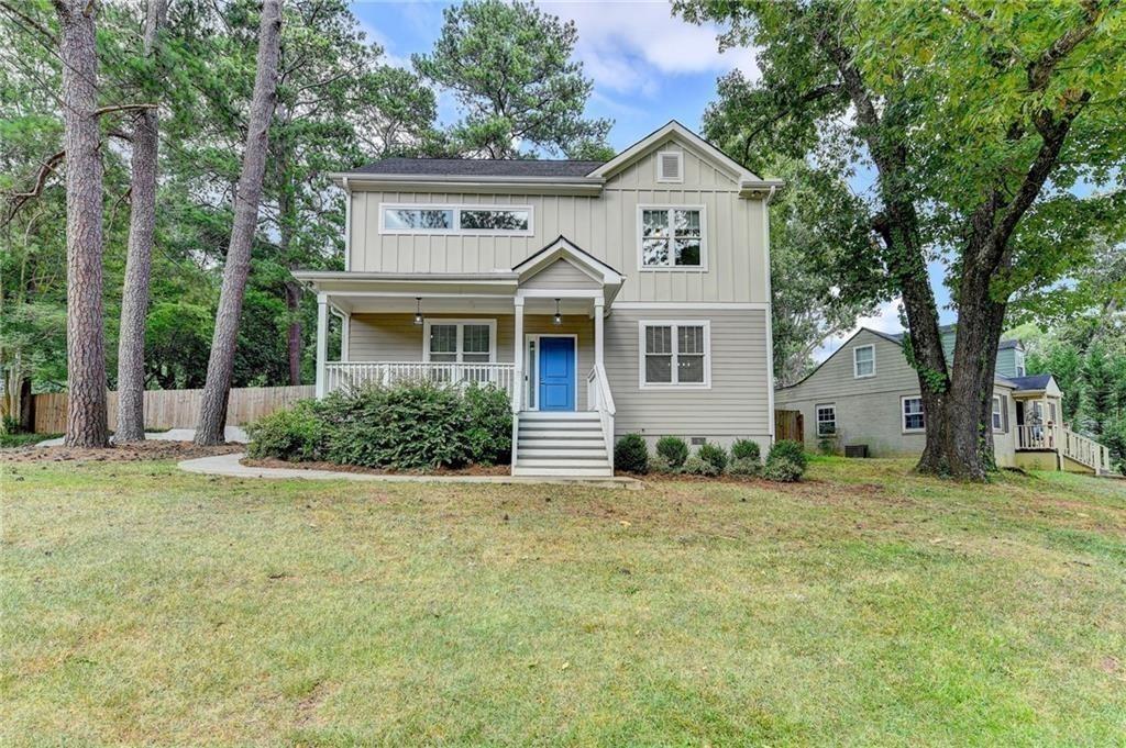 front view of a house with a yard