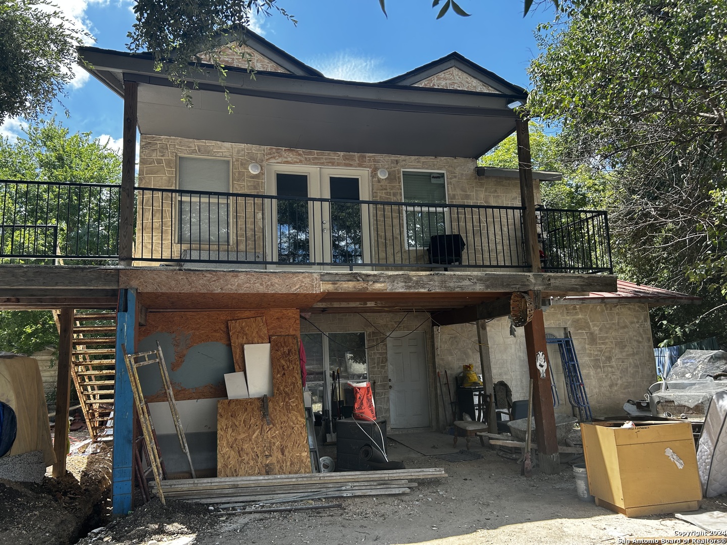 a front view of a house with a porch