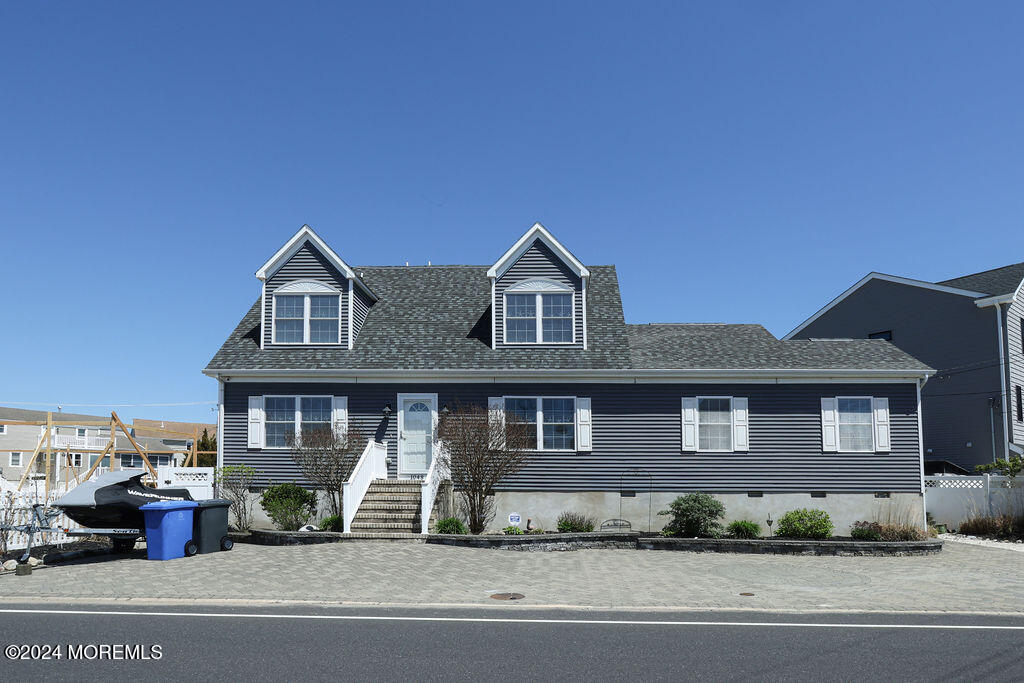 a front view of a house with a porch