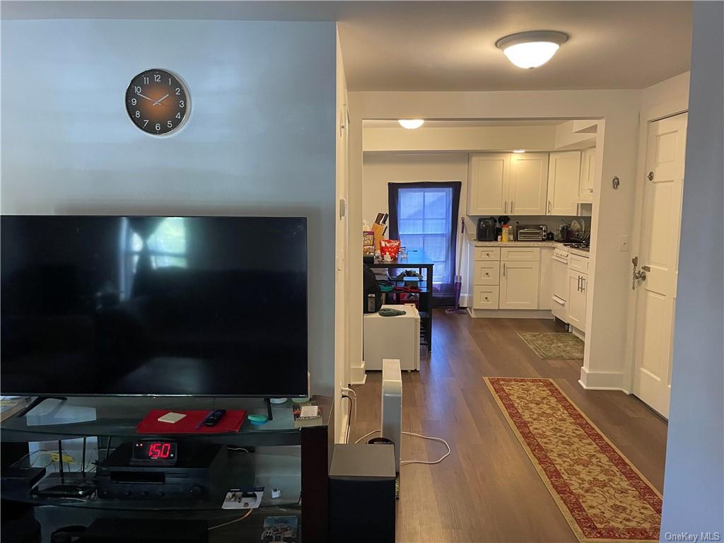 a kitchen with furniture a counter space and a sink