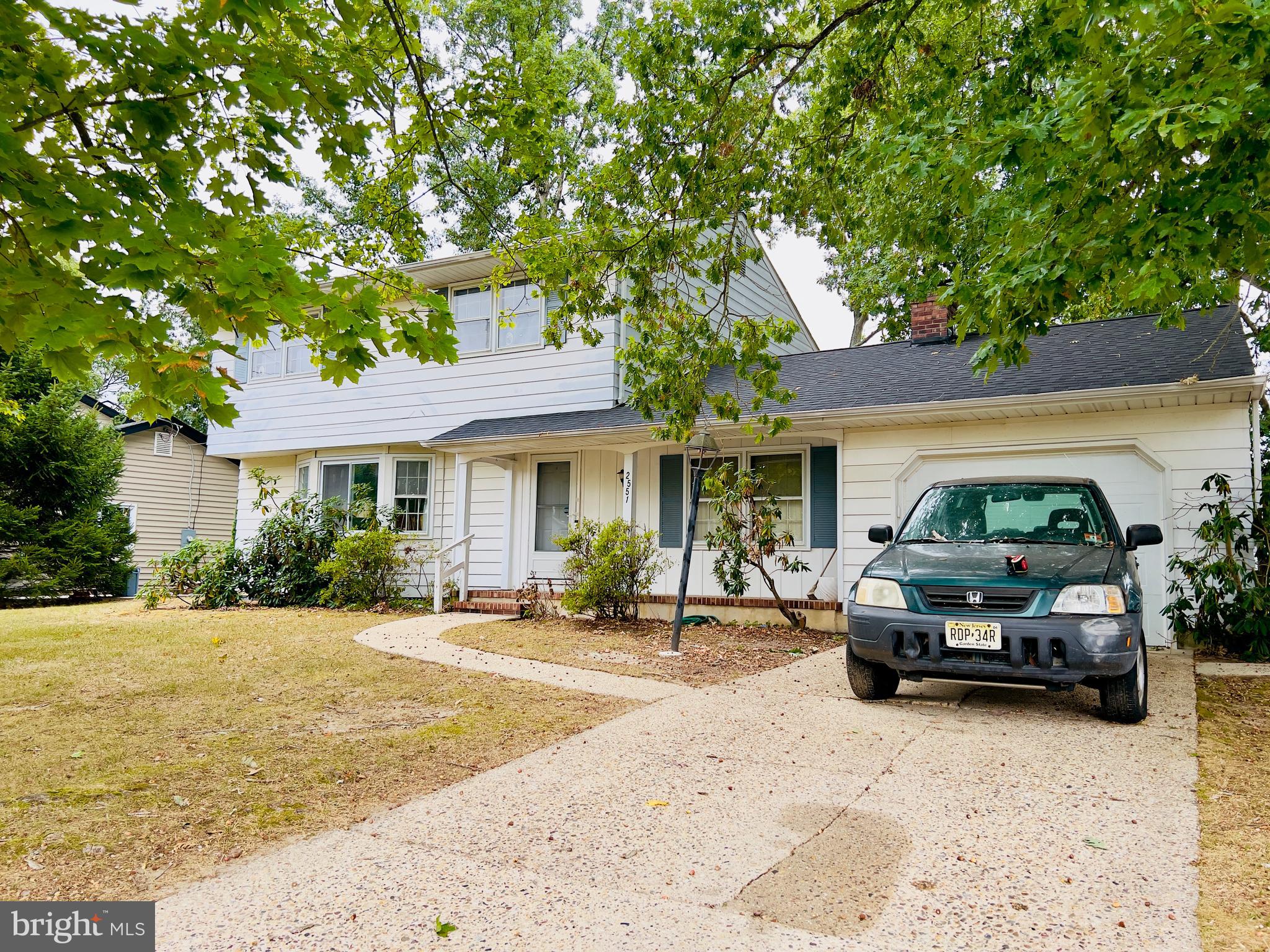 a front view of a house with a patio