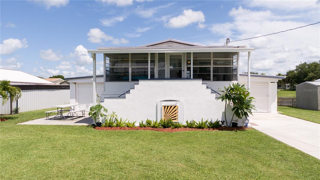 a house view with a garden space