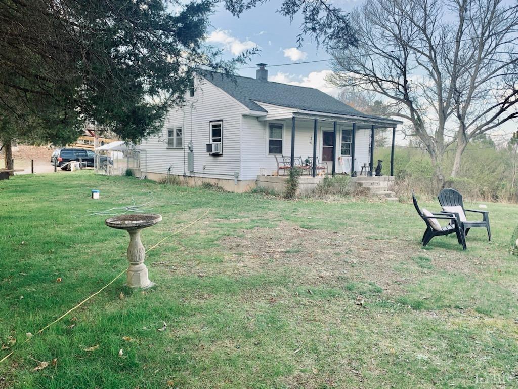 a house view with a garden space