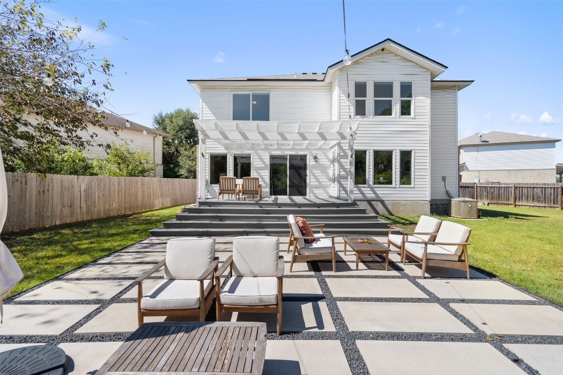 a view of a yard with furniture