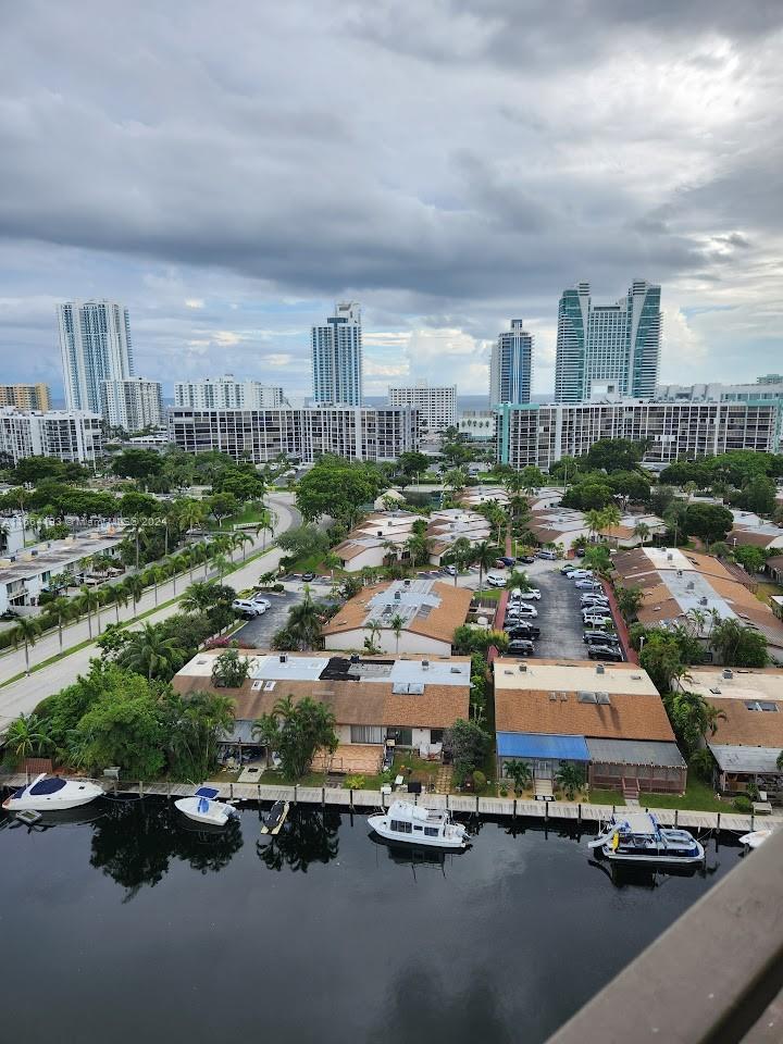 an aerial view of residential building with parking space