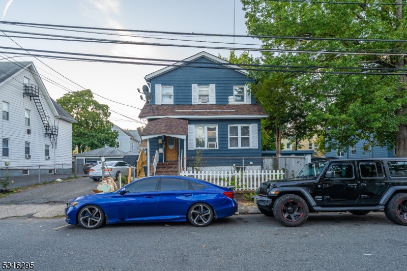 a car parked in front of a house