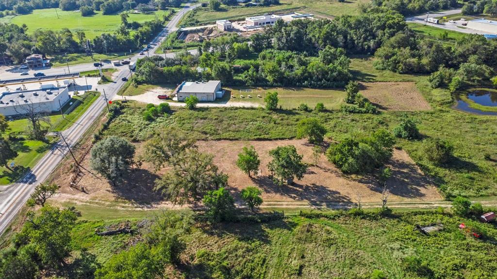 a aerial view of a house with a yard