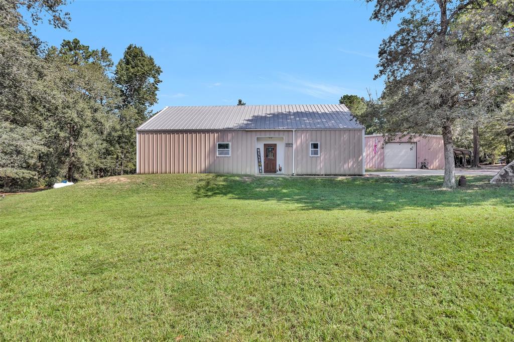 The main home is a red iron weld and bolted house structure.