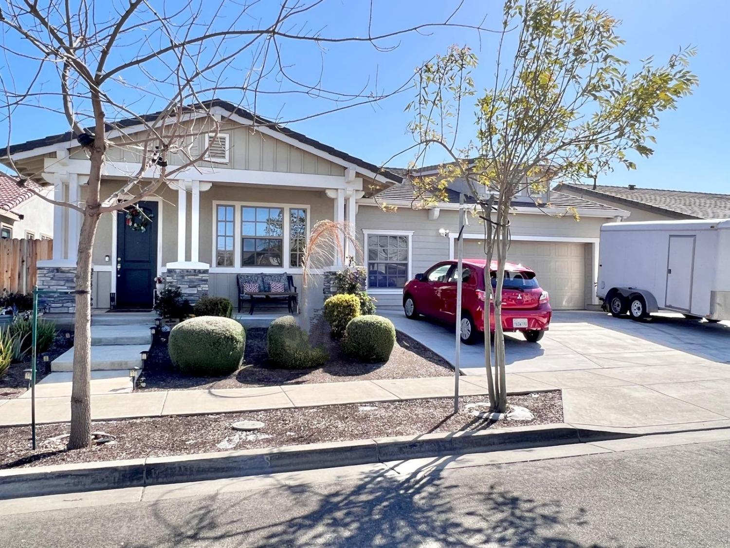 a front view of a house with patio