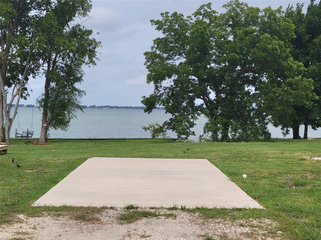 a view of a park and trees